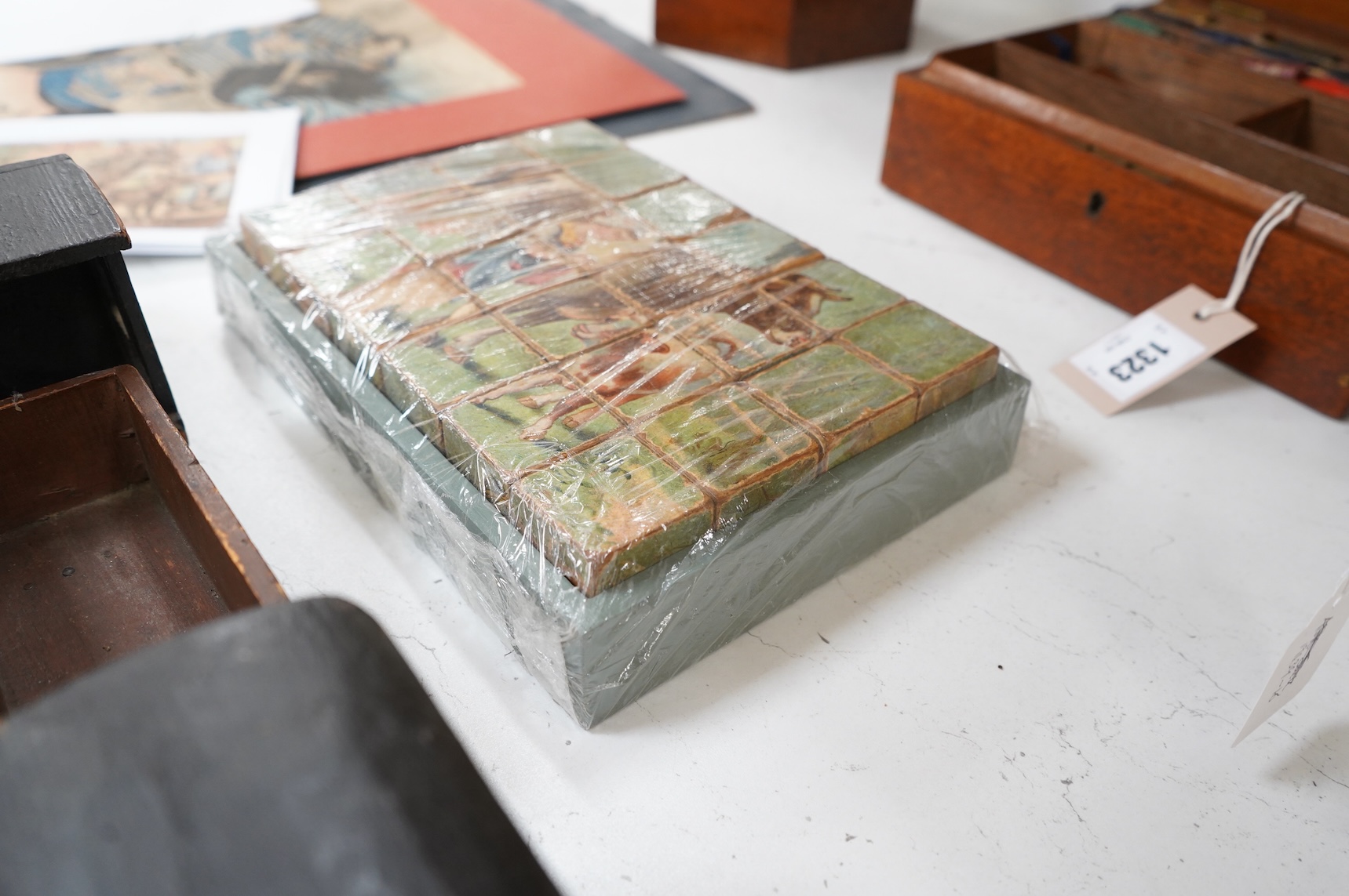 A painted wooden pull a long toy train-48cm long and two carriages, together with a painted wooden block puzzle